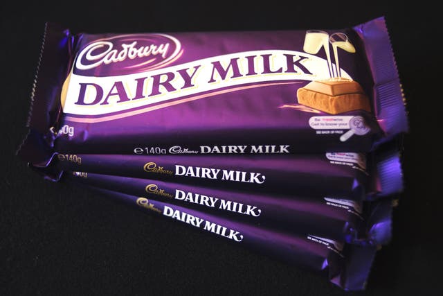 Cadbury's Dairy Milk chocolate bars sit arranged for a photo at a store in London, U.K., on Monday, Nov. 9, 2009