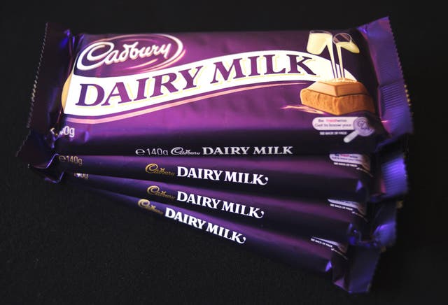 Cadbury's Dairy Milk chocolate bars sit arranged for a photo at a store in London, U.K., on Monday, Nov. 9, 2009