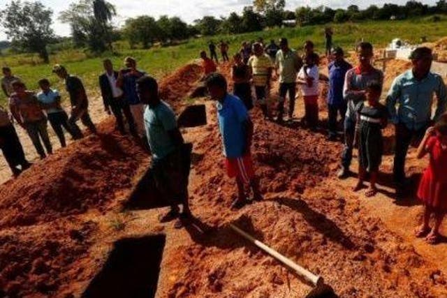 The funeral of 10 land activists killed in 2017 when police arrived at a Santa Lucia farm in Pau D’Arco, Brazil