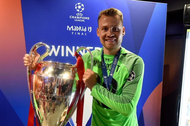 Outgoing Liverpool goalkeeper Simon Mignolet with the Champions League trophy