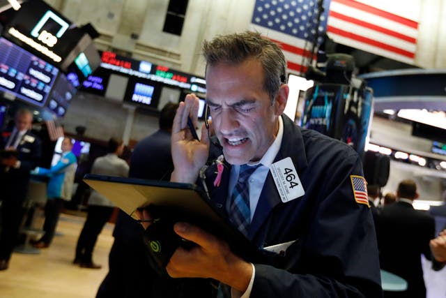 Trader Gregory Rowe on the floor of the New York Stock Exchange on Monday, August 5, as stocks plunged on fears of the trade war with China escalating