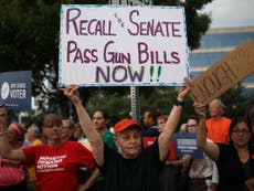 Protesters descend on NRA headquarters to demanding tighter gun laws