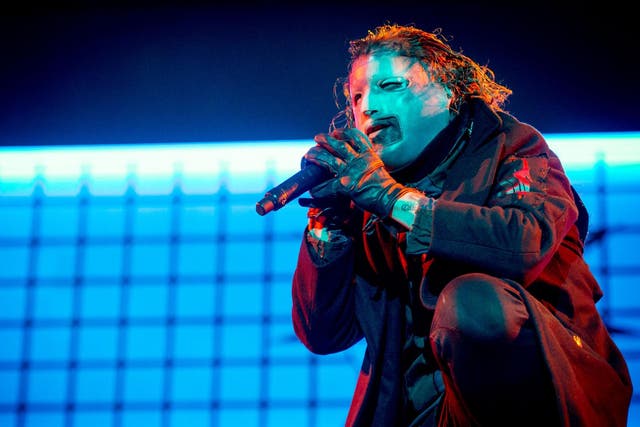 Corey Taylor performs in his new mask during a Slipknot show, 2019