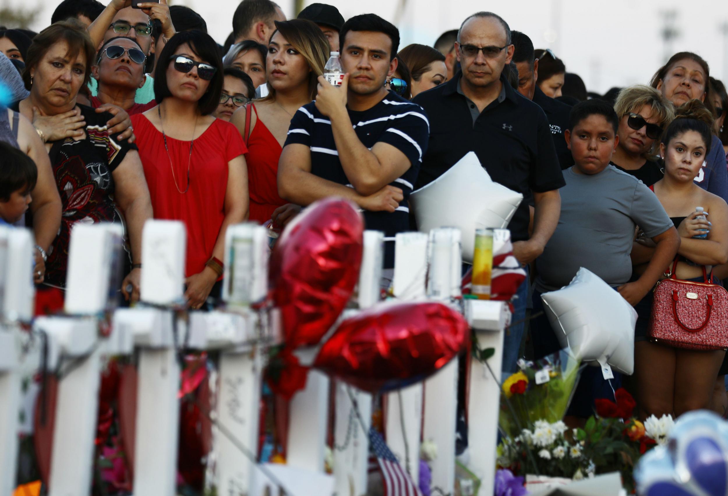 Mourners in El Paso, Texas, following a mass shooting in which Latinos were targeted