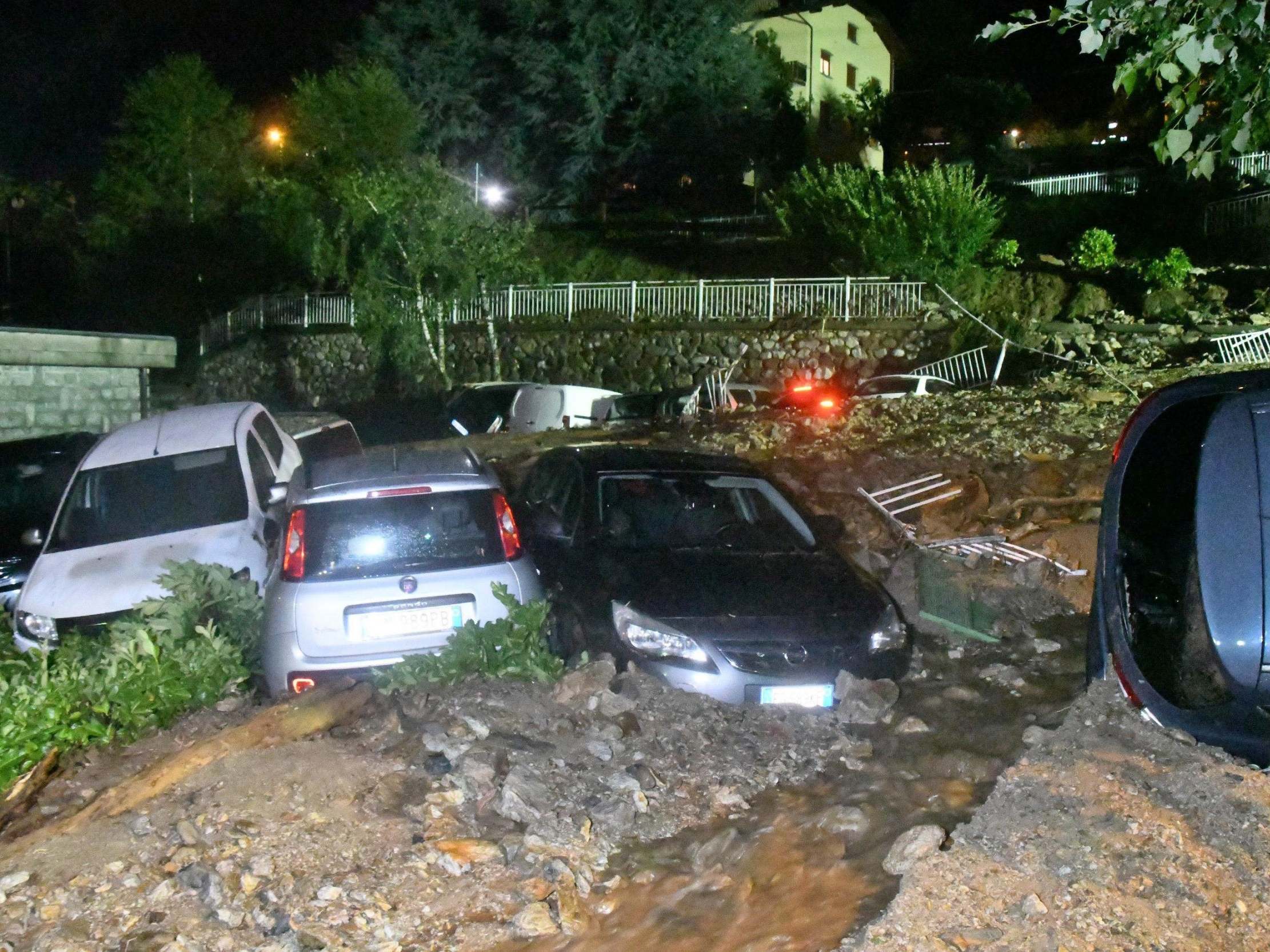 Wrecked vehicles in Casargo, Lecco, Italy, on 7 August
