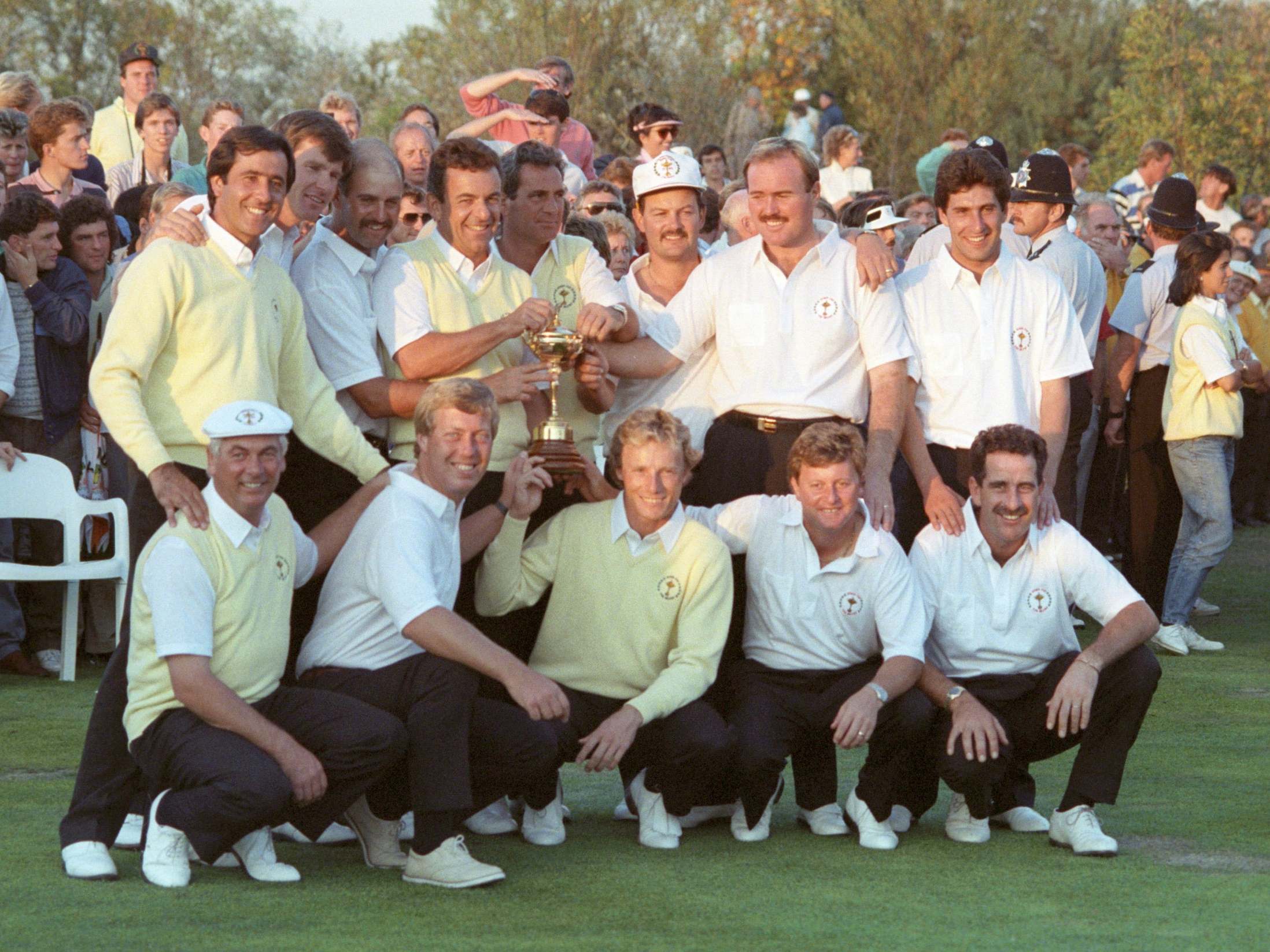 The European team (Brand back row, third from right) celebrate retaining the Ryder Cup in 1989