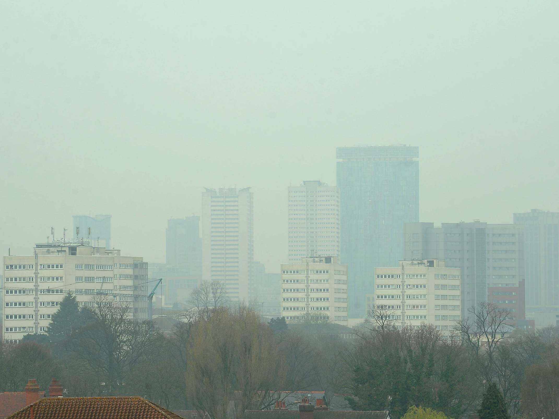 Dust particles and pollution from cars hanging over Birmingham