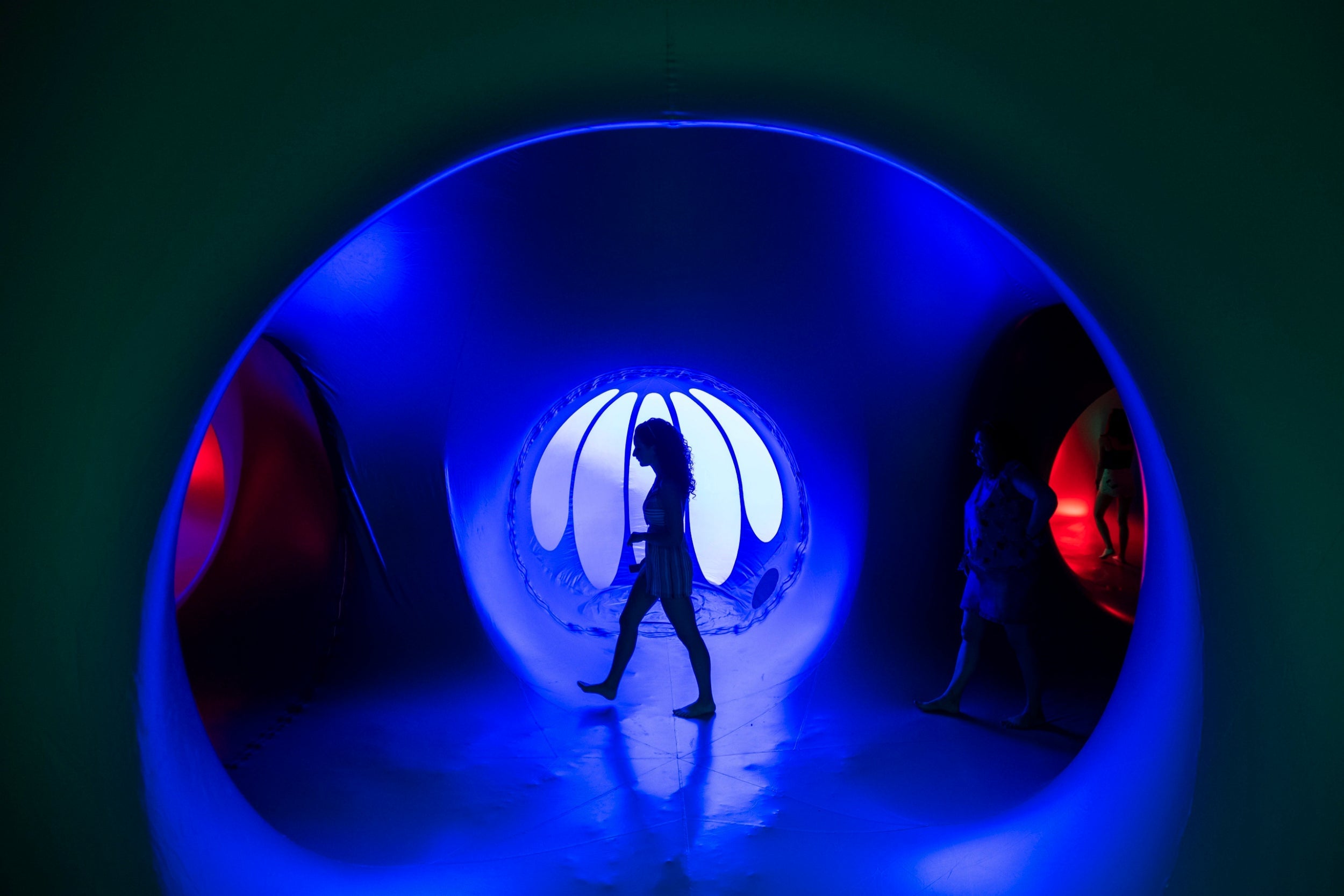 A visitor walks through an art installation at Sziget Festival in Budapest