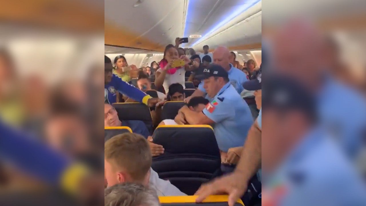 Footage shows a British passenger dragged off a Ryanair flight
