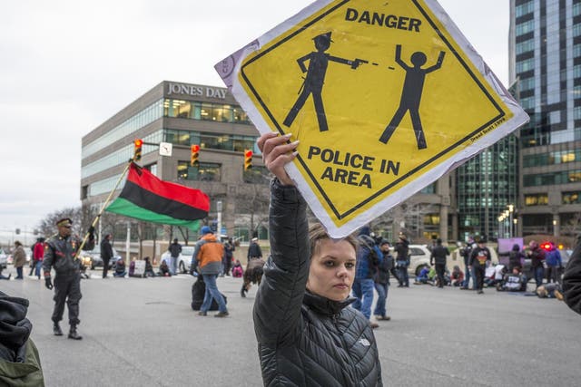 Protesters on the street the day after a grand jury declined to indict Cleveland Police officer Timothy Loehmann for the fatal shooting of Tamir Rice on 22 November 2014.