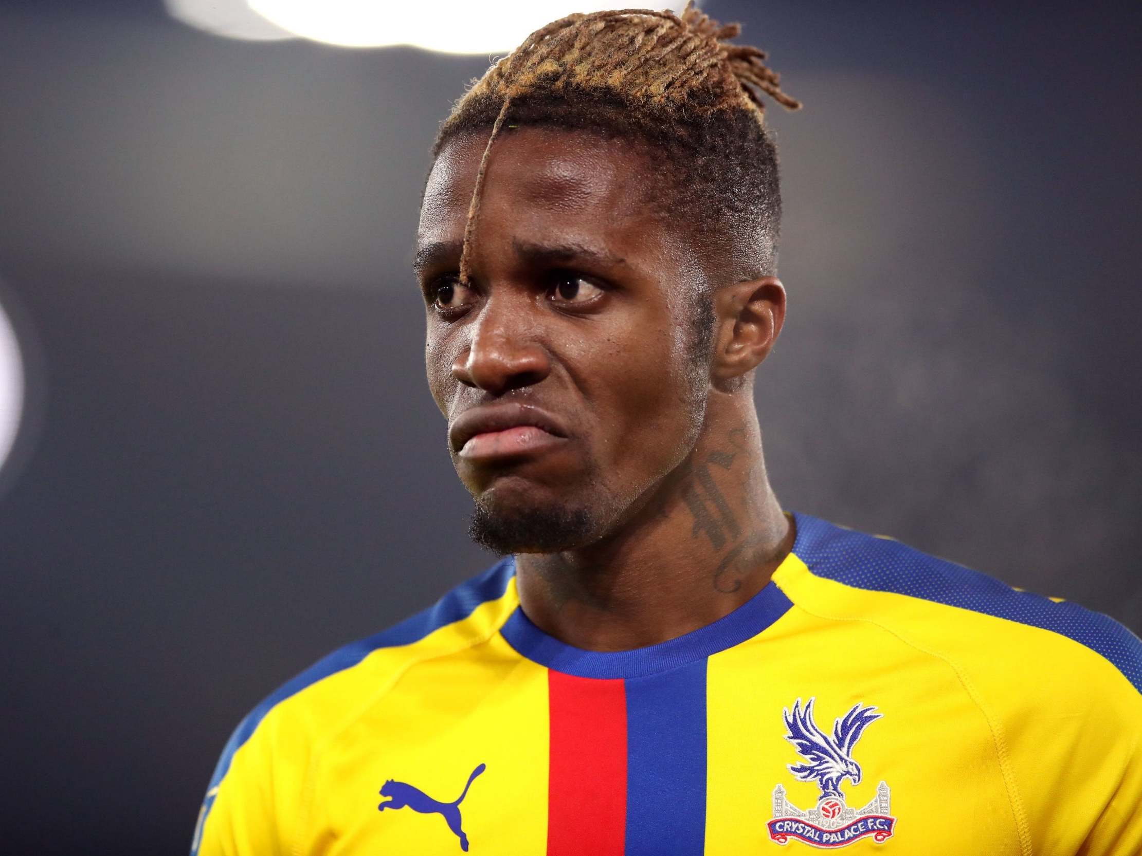 Wilfried Zaha is facing a Crystal Palace fan backlash after trying to leave the club