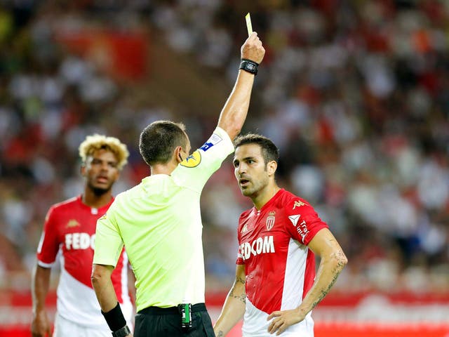 Cesc Fabregas saw his yellow card upgraded to a red after a VAR review
