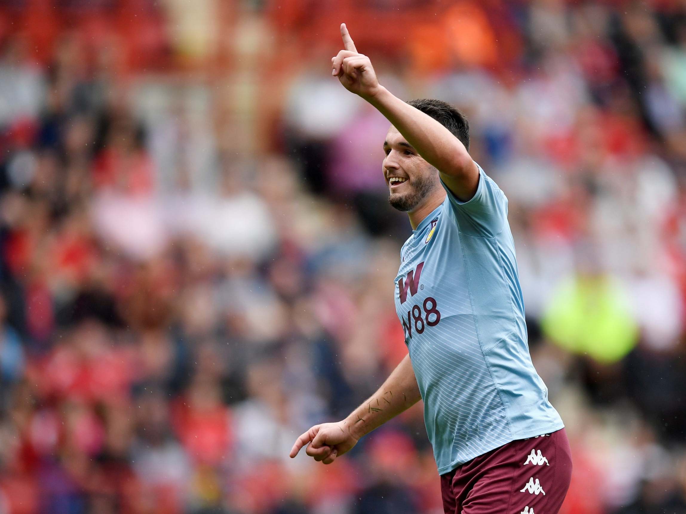John McGinn has played down any chance of leaving Aston Villa for Manchester United