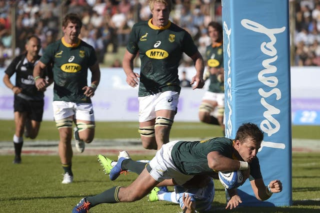 Handre Pollard crosses for South Africa's second try in their victory over Argentina