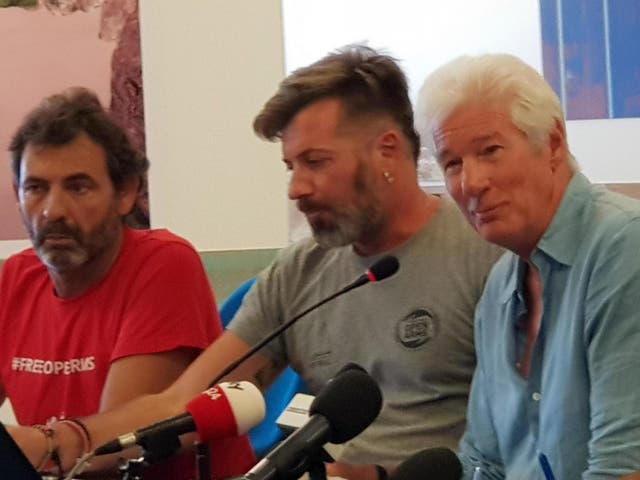 Richard Gere speaks during a press conference on the island of Lampedusa on 10 August 2019, a day after he visited the Spanish humanitarian ship that has been stuck at sea with 121 migrants on board for over a week, after Italy and Malta have denied it entry.