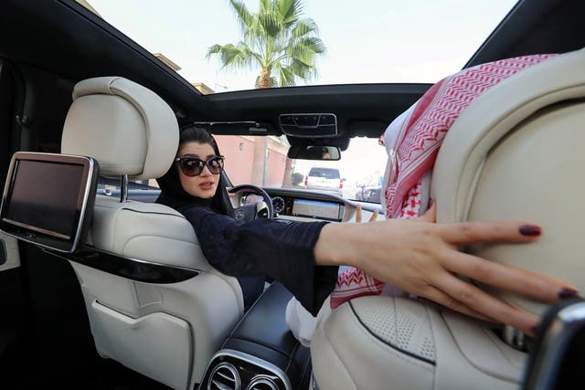 <p>A Saudi woman practices driving in Riyadh, on April 29, 2018, ahead of the lifting of a ban on women driving</p>