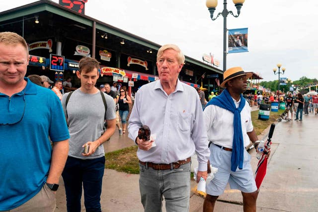 Republican presidential candidate Bill Weld walks through the Iowa State Fair on 11 August