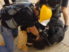 Men disguised as protesters help police crackdown in Hong Kong 