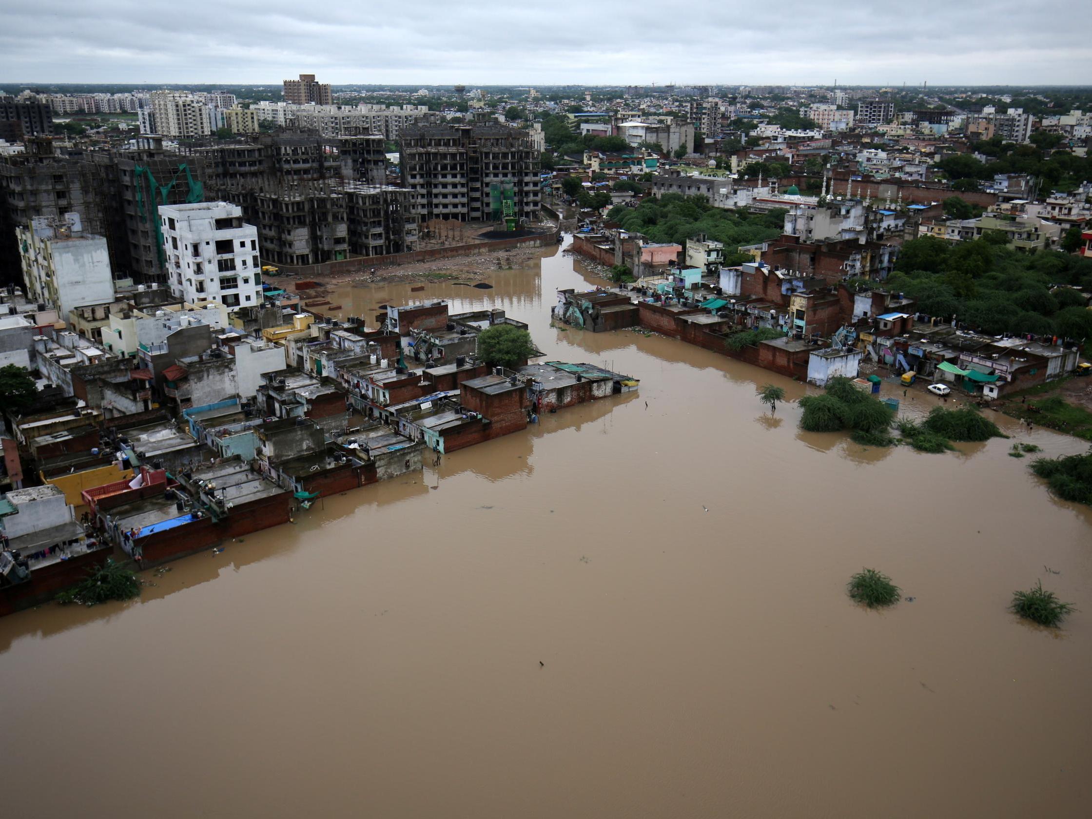 An aerial view shows a flooded residential area after heavy rains in Ahmedabad, India on 10 August 2019.