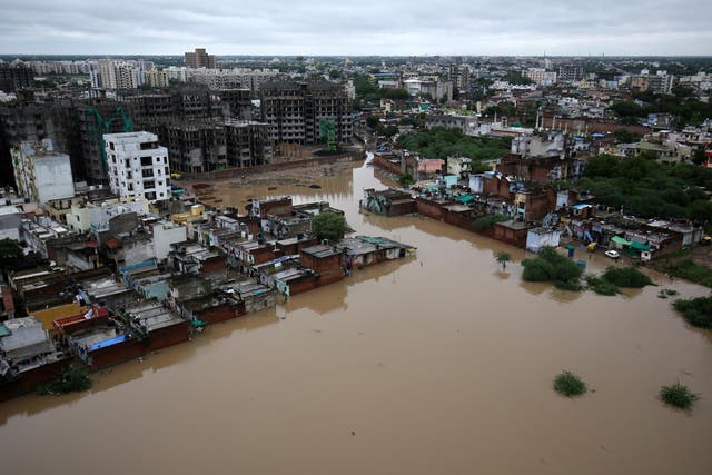 An aerial view shows a flooded residential area after heavy rains in Ahmedabad, India on 10 August 2019.