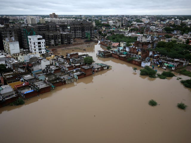 India floods At least 157 dead and hundreds of thousands evacuated as