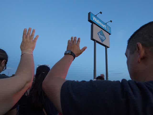 Many gathered to pray at the makeshift memorial for 22 victims of a far-right inspired mass shooting in Walmart's El Paso store