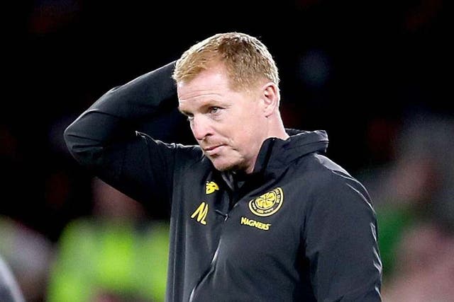 Neil Lennon looks on as Celtic are eliminated from the Champions League
