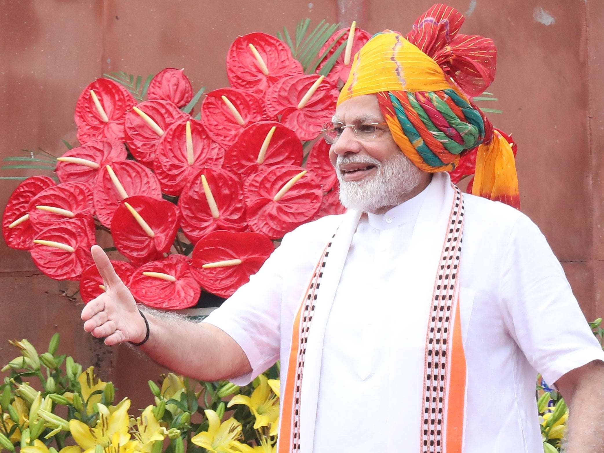 Narendra Modi greets officials and ministers (unseen) after addressing the nation at the Red Fort on Thursday