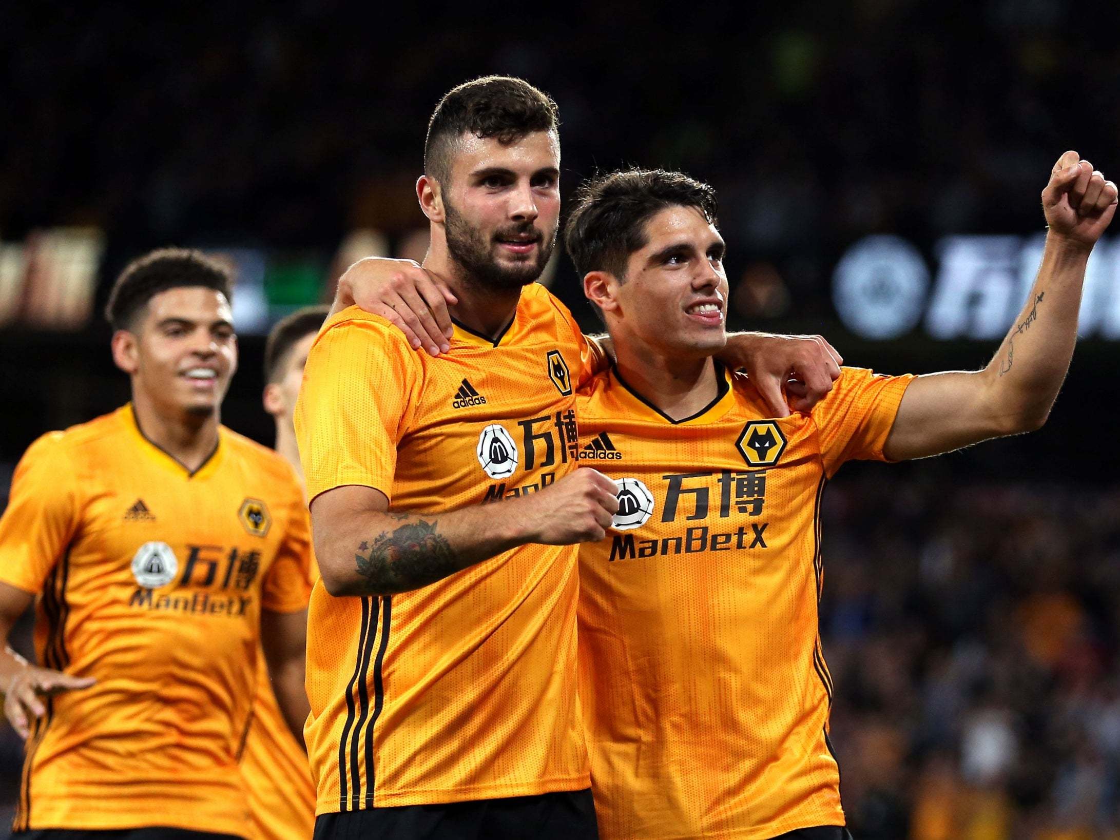 Wolves celebrate after Pedro scores