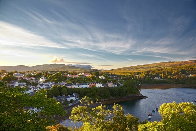 View of Portree, Skye’s ‘diminutive capital’, with the Old Man of Storr in the background
