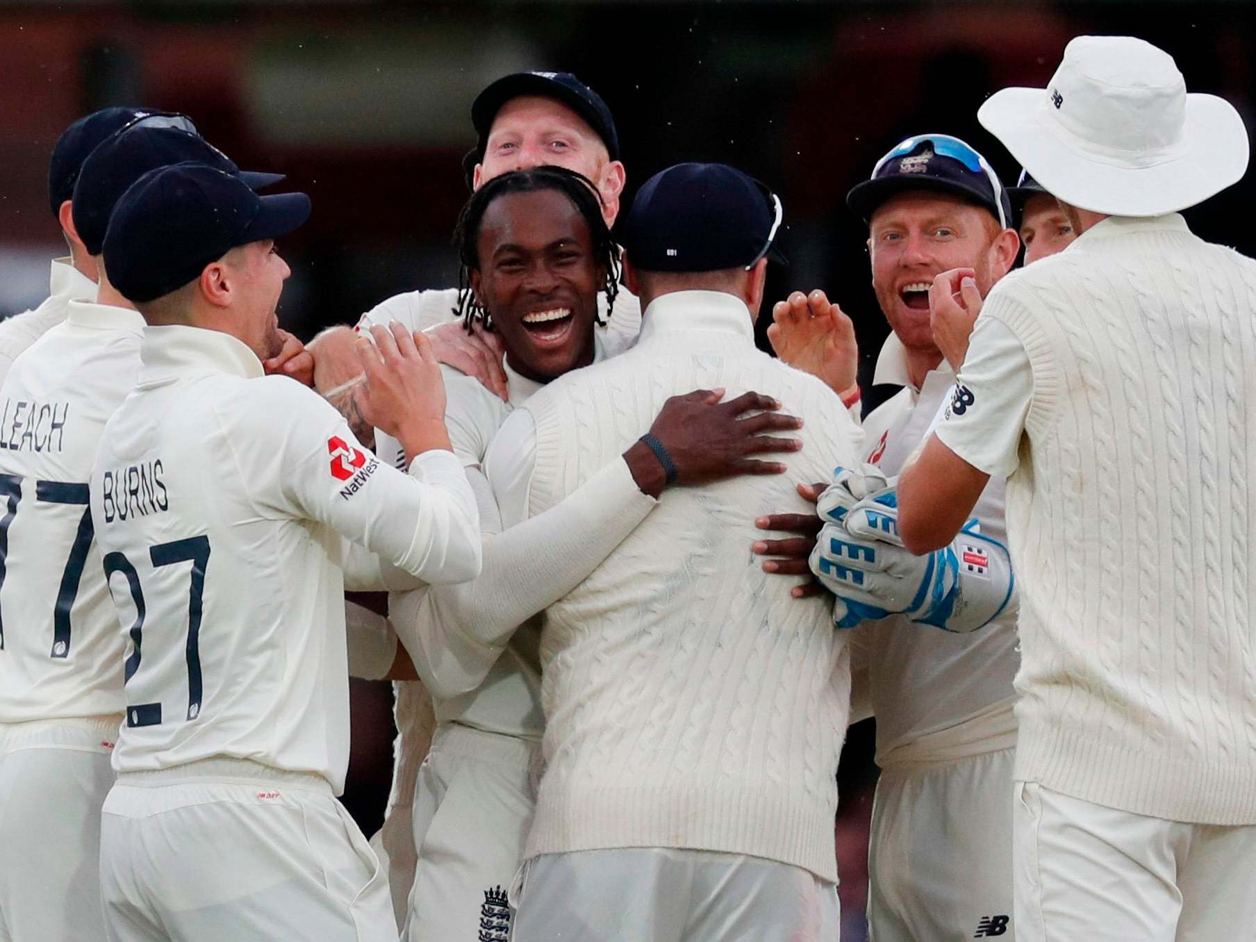 Jofra Archer is congratulated by his teammates