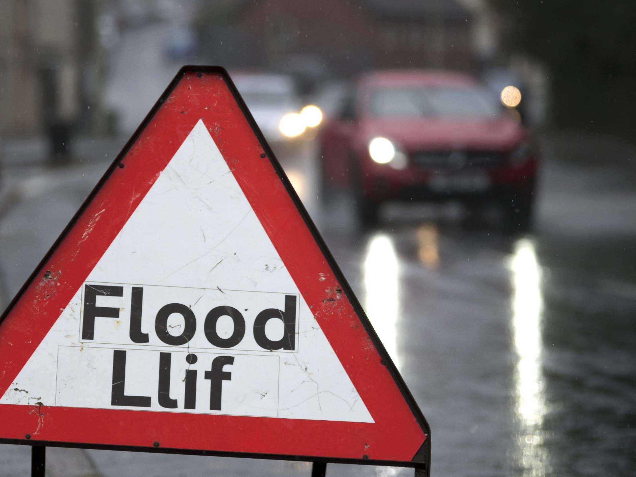 Flood warning signs were put out in Pontypridd, Wales, after the Met Office issued a yellow weather warning