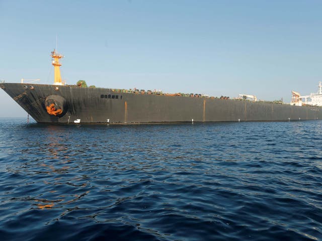 The name of Iranian oil tanker Grace 1 is seen removed as it sits anchored after the Supreme Court of the British territory lifted its detention order, in the Strait of Gibraltar