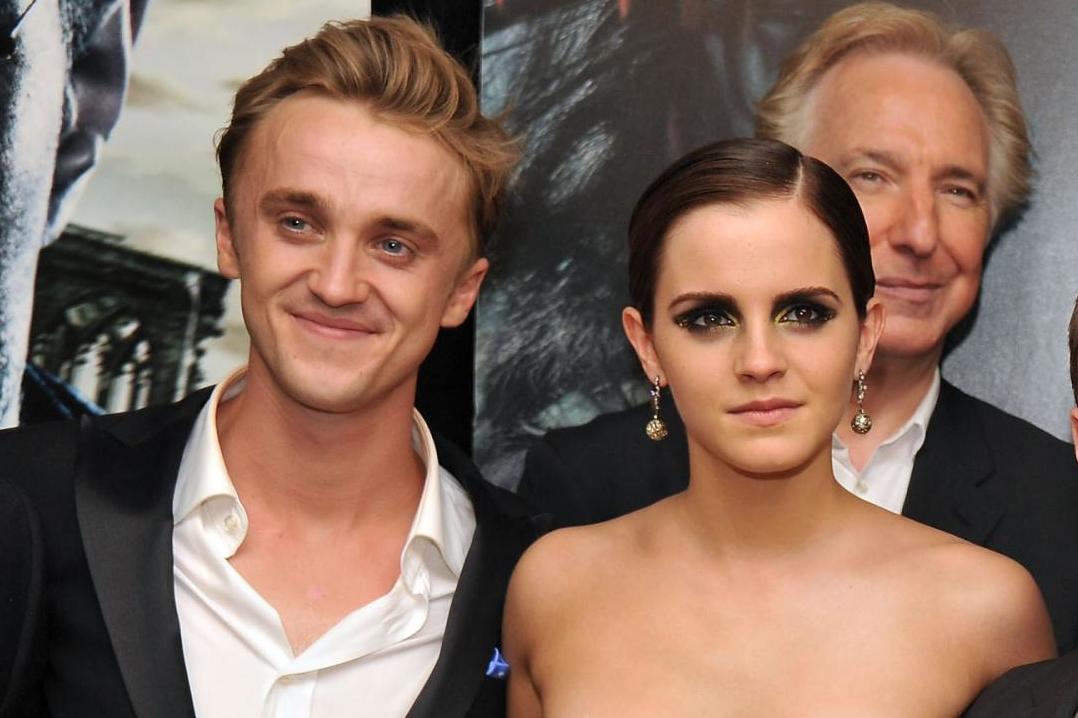 Tom Felton and Emma Watson attend the New York premiere of "Harry Potter And The Deathly Hallows: Part 2" at Avery Fisher Hall, Lincoln Center on July 11, 2011 in New York City.