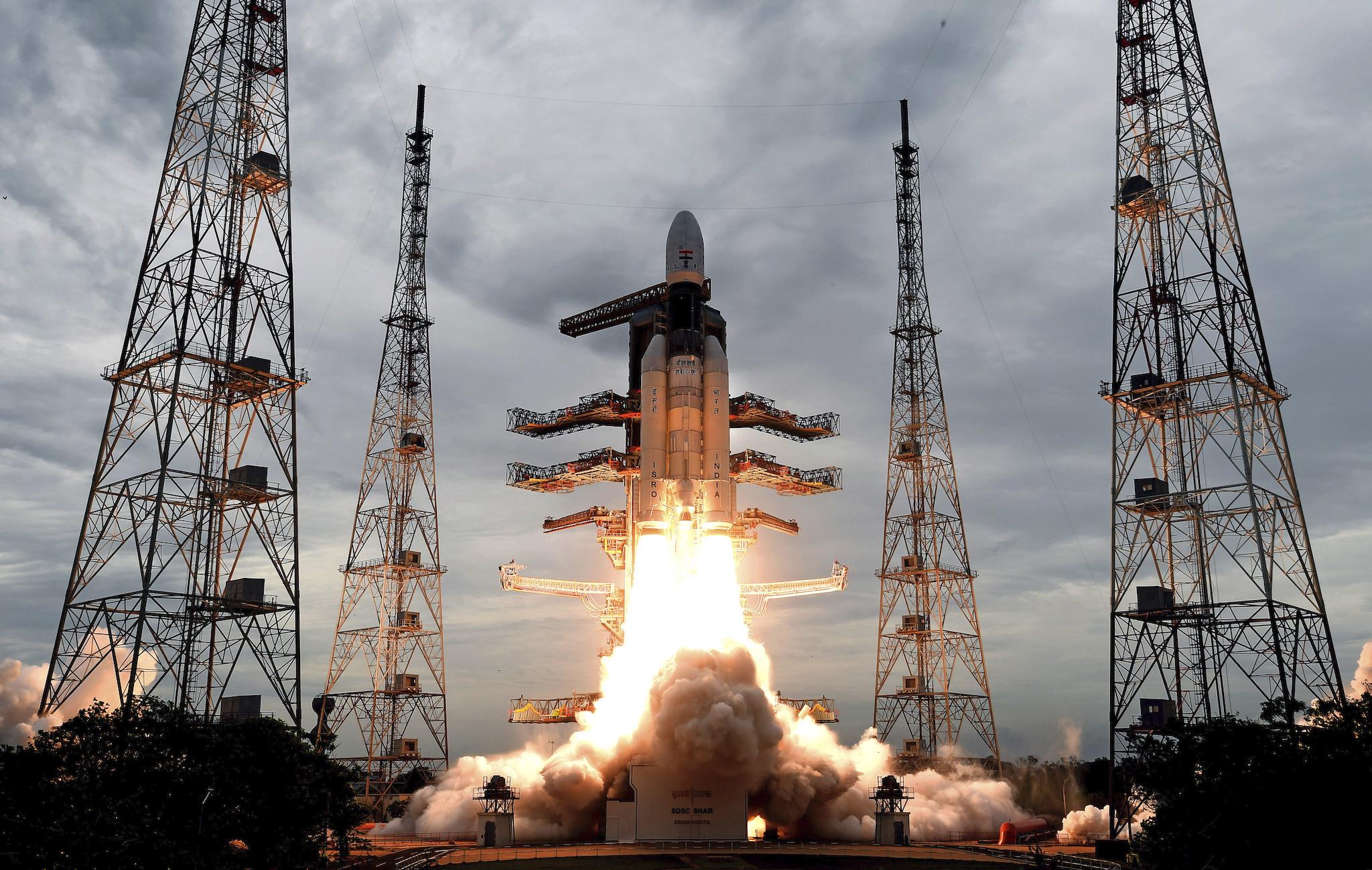 This photo released by the Indian Space Research Organization (ISRO) shows its Geosynchronous Satellite launch Vehicle (GSLV) MkIII carrying Chandrayaan-2 lift off from Satish Dhawan Space center in Sriharikota, India