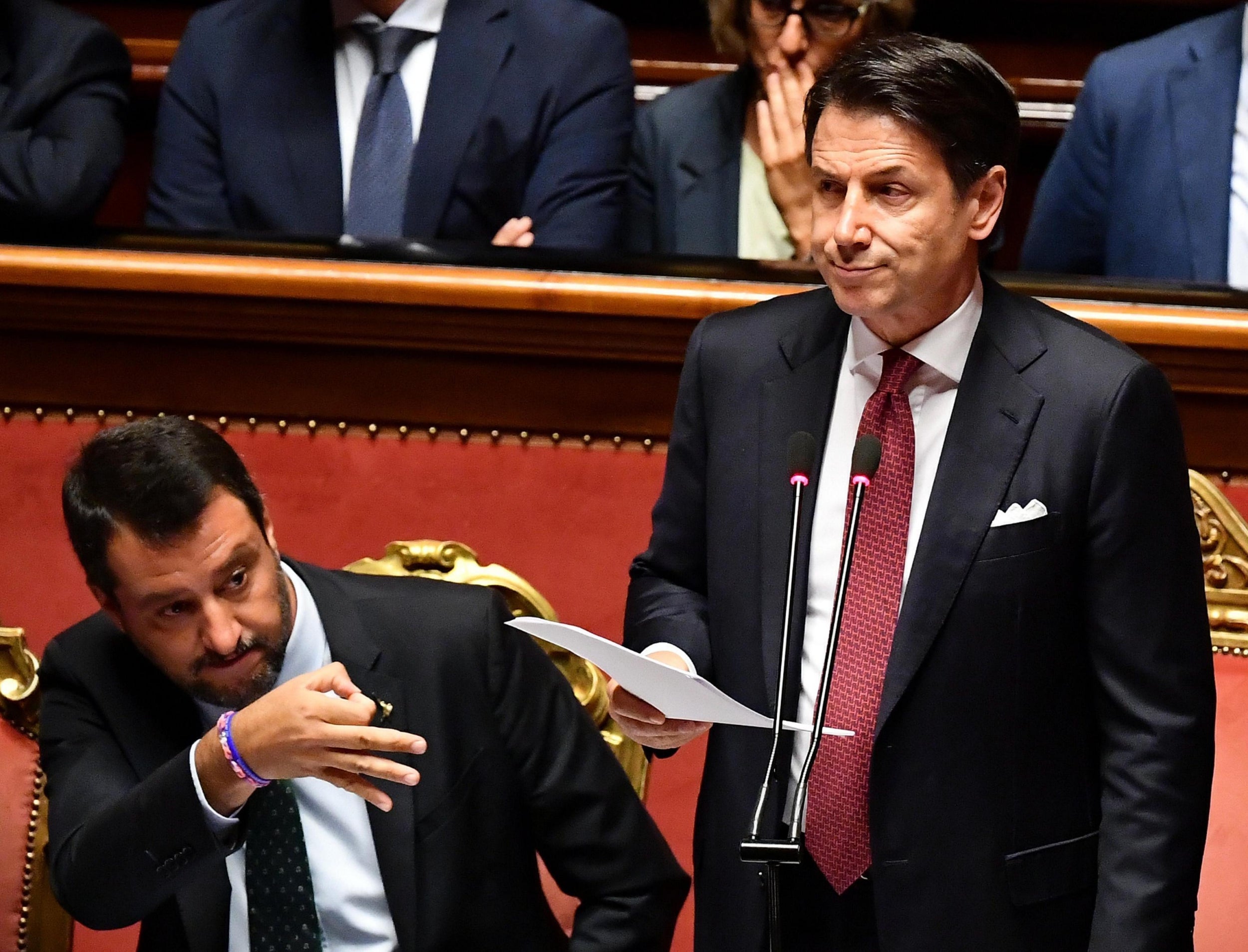 Italian prime minister Giuseppe Conte (right) flanked by League leader Matteo Salvini in the Italian senate