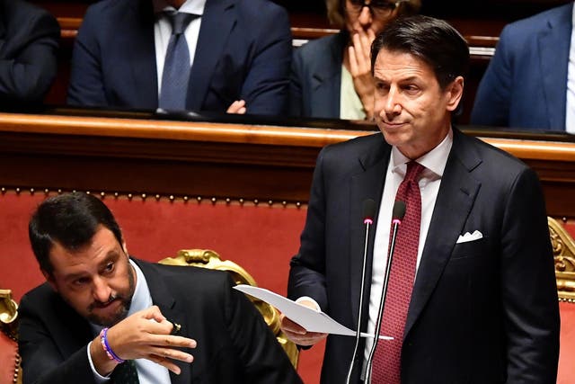 Italian prime minister Giuseppe Conte (right) flanked by League leader Matteo Salvini in the Italian senate