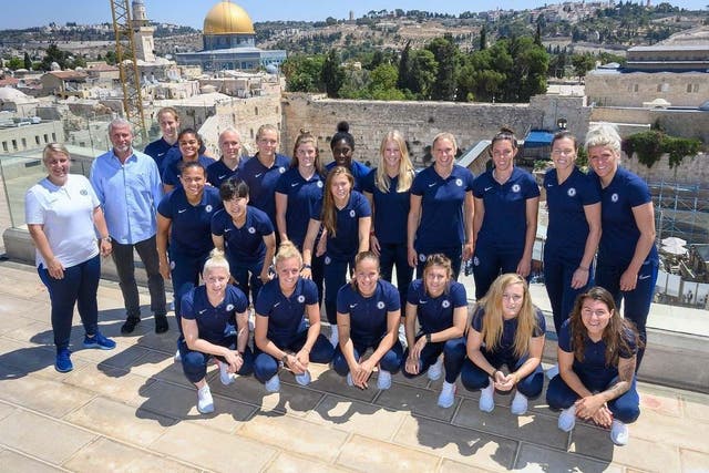 Roman Abramovich poses for a picture with Chelsea Women in Jerusalem
