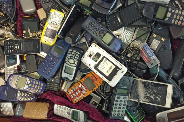 Scientists found many old mobile devices contain elements such as gold, arsenic and rare elements such as indium (file photo)