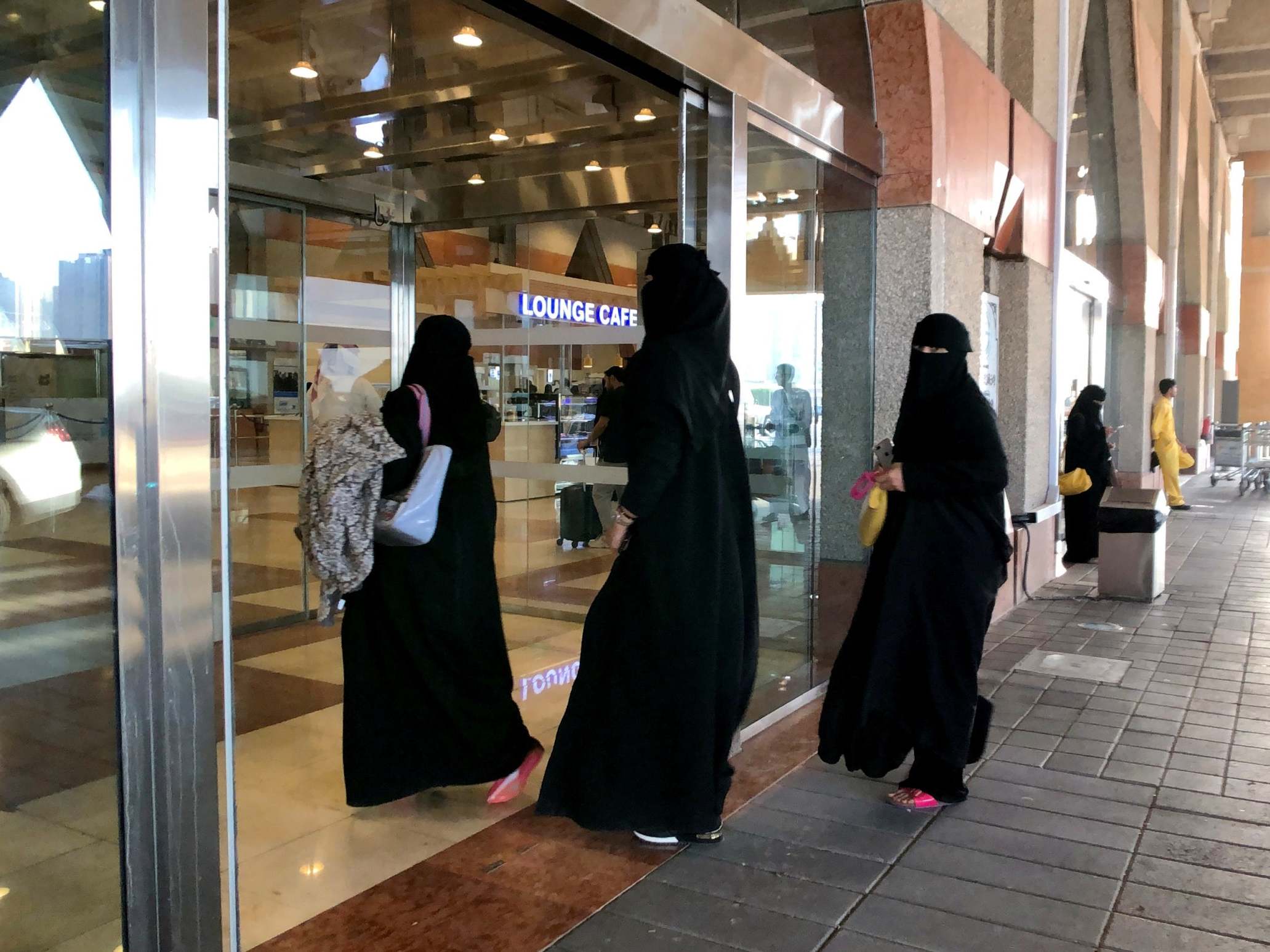 Saudi women enter the railway station in Dammam