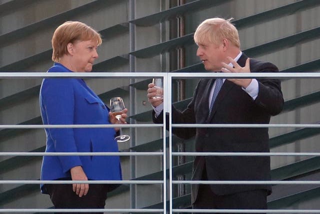 Will they be toasting a deal? The two leaders share a drink in Berlin this week