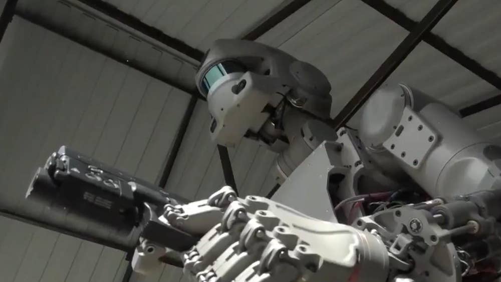 Gun-toting humanoid robot sent into space