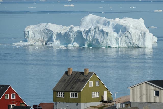 An iceberg floats in Greenland's Disko Bay during unseasonably warm July weather.