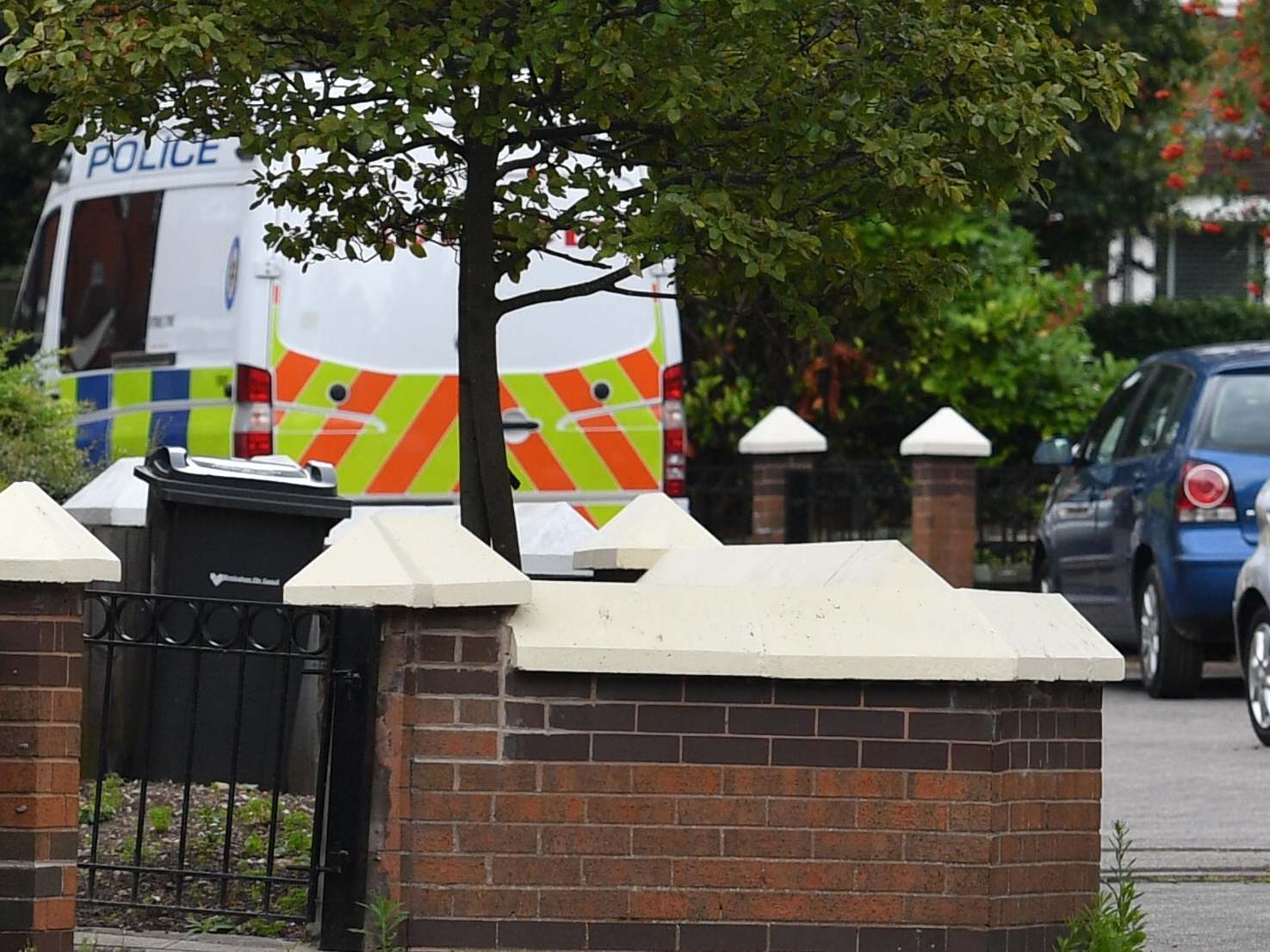 Police outside an address Blossomville Way, Acocks Green, after a 10-year-old boy was found dead