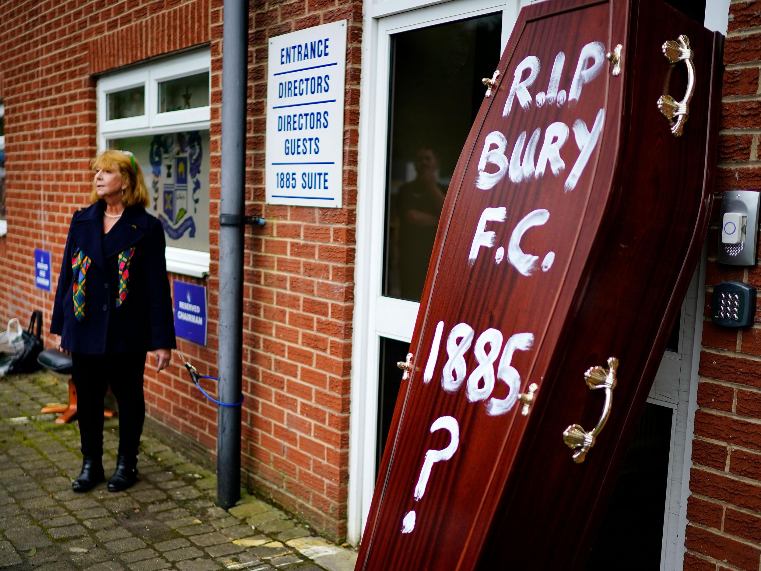 Joy Hart outside Gigg Lane with a coffin