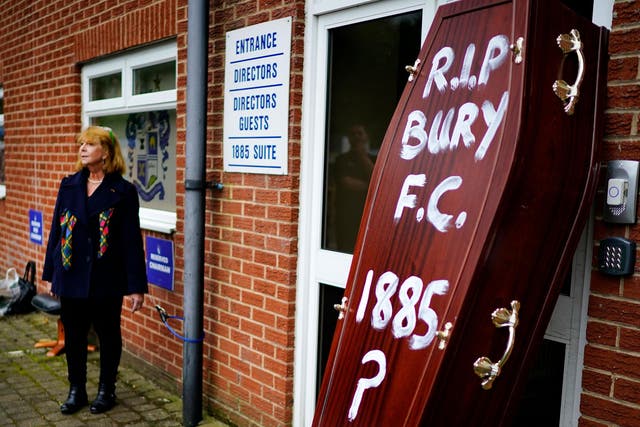 Joy Hart outside Gigg Lane with a coffin