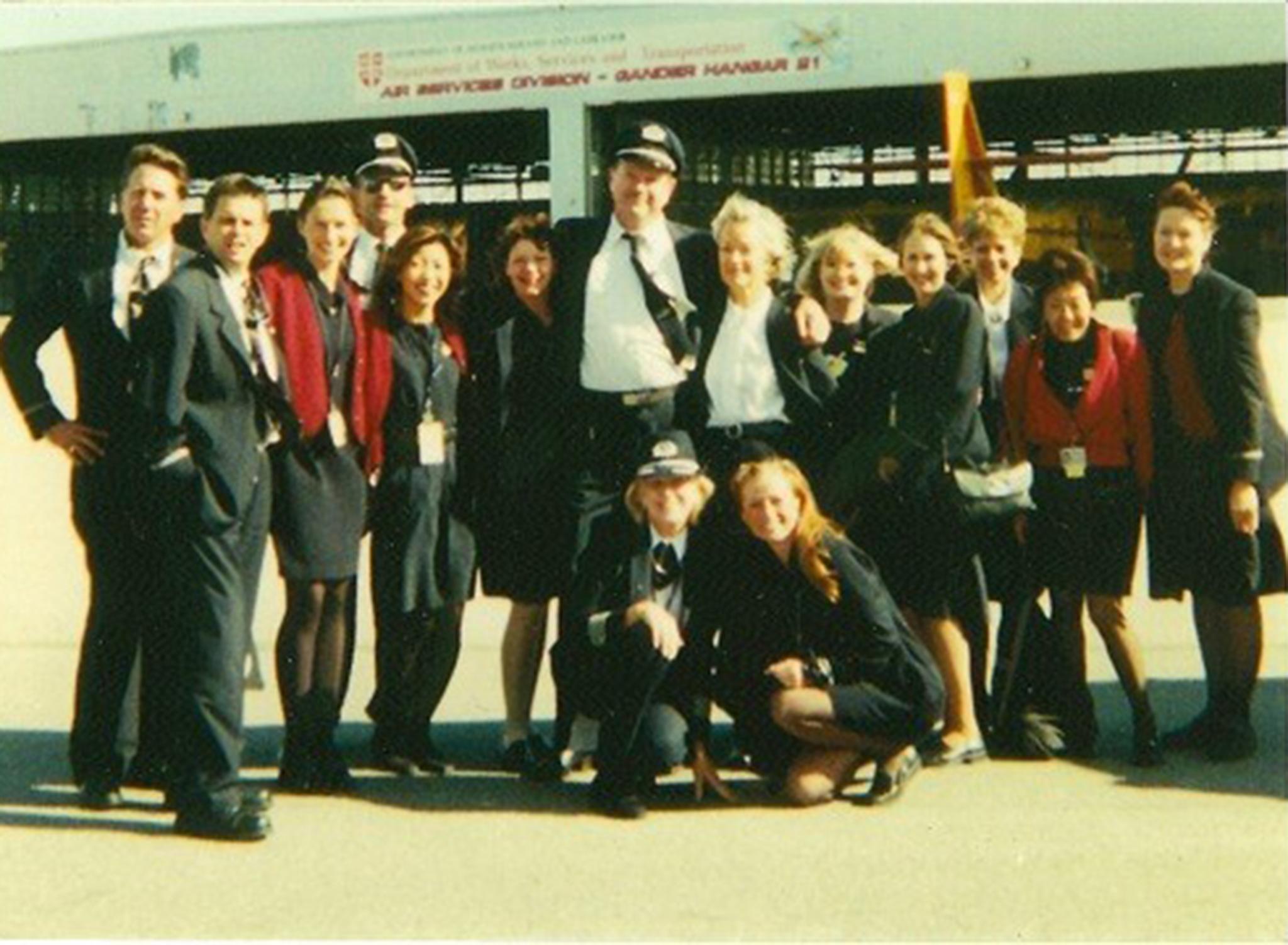 Bass (front left) and her crew on the morning of 12 September 2001 after they had spent 28 hours on the plane (Beverley Bass/American Airlines)