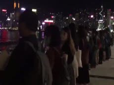 Hong Kong protesters form human chain and sing Les Miserables