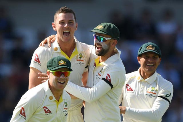Australia celebrate after Josh Hazlewood takes another wicket
