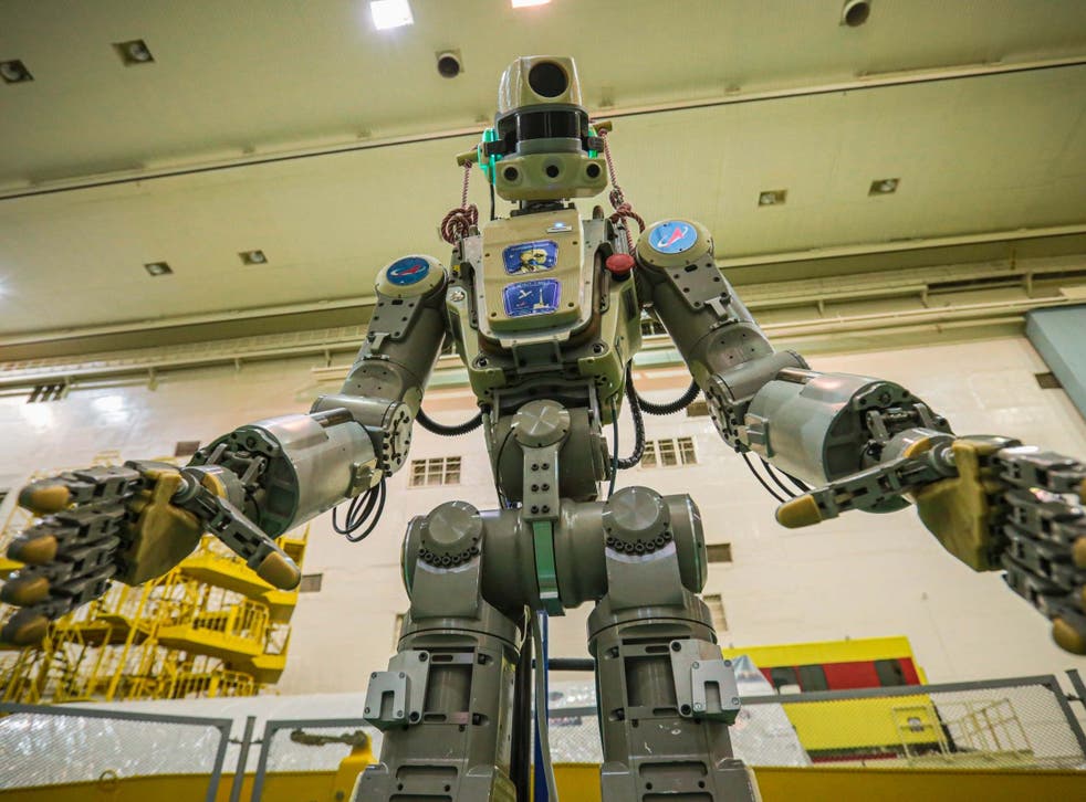 Fedor robot before being loaded into Soyuz capsule to be launched into space from Kazakhastan
